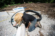 Tyler Feeding Water Line Through Foundation